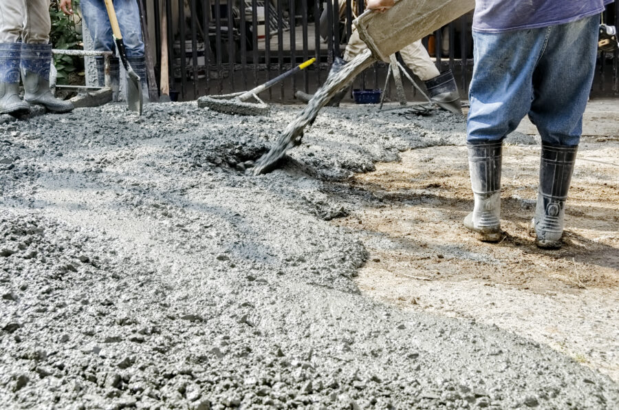 Men Cementing Road